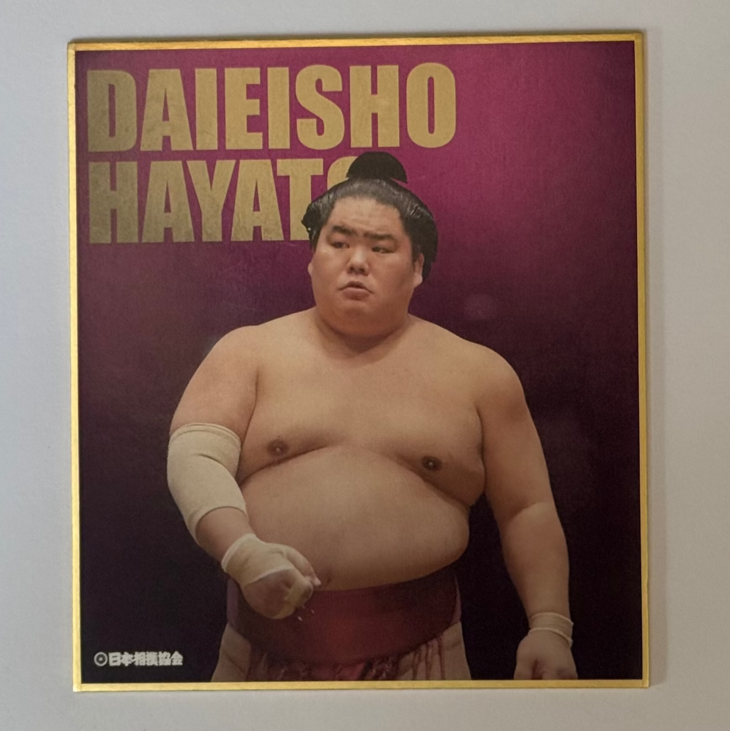 Purple card with text and photo image