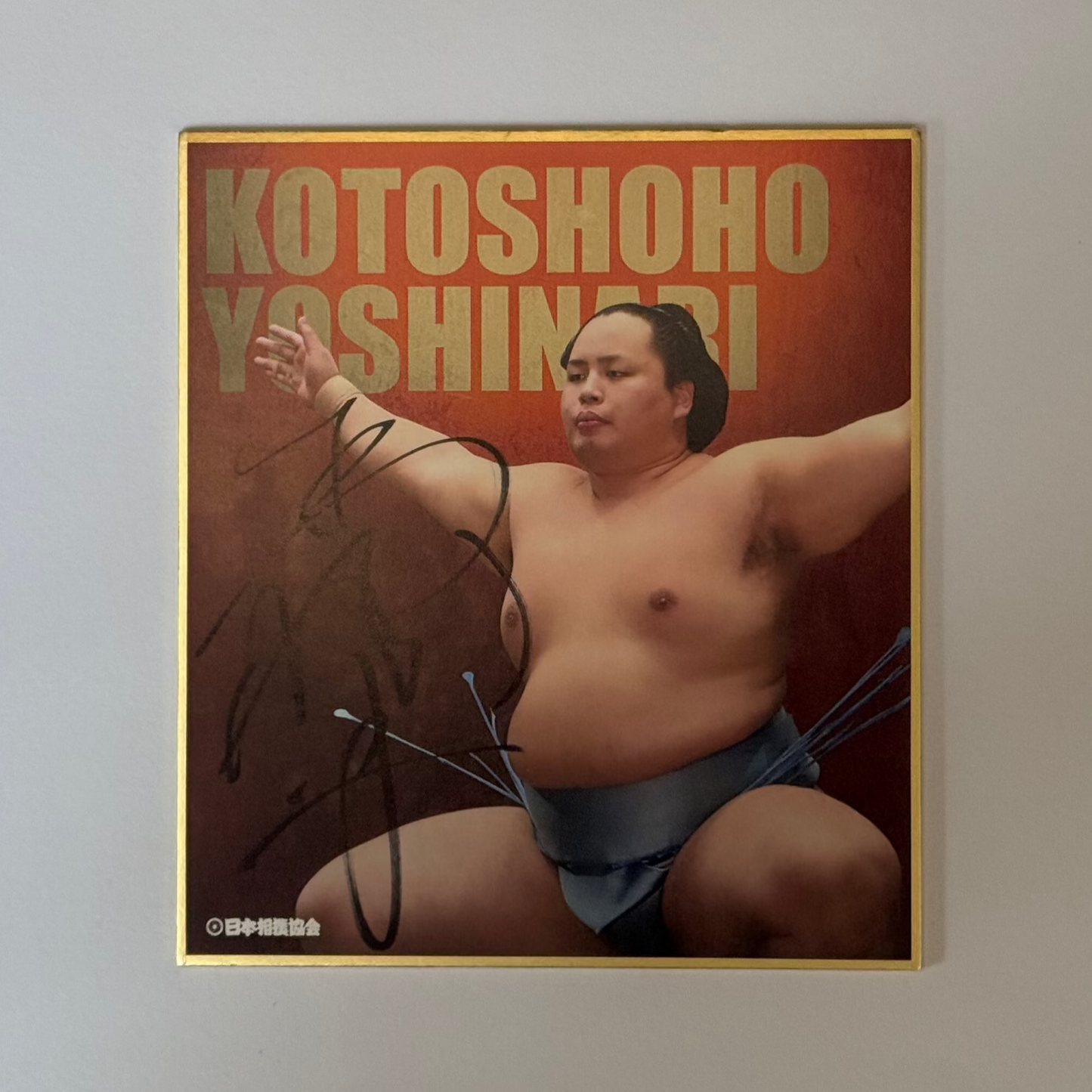 Orange card with text and photo image