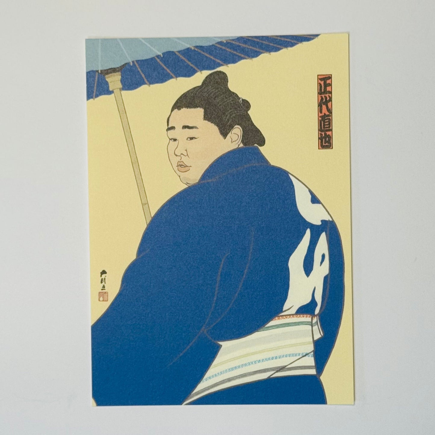 Illustration of a sumo wrestler wearing a kimono